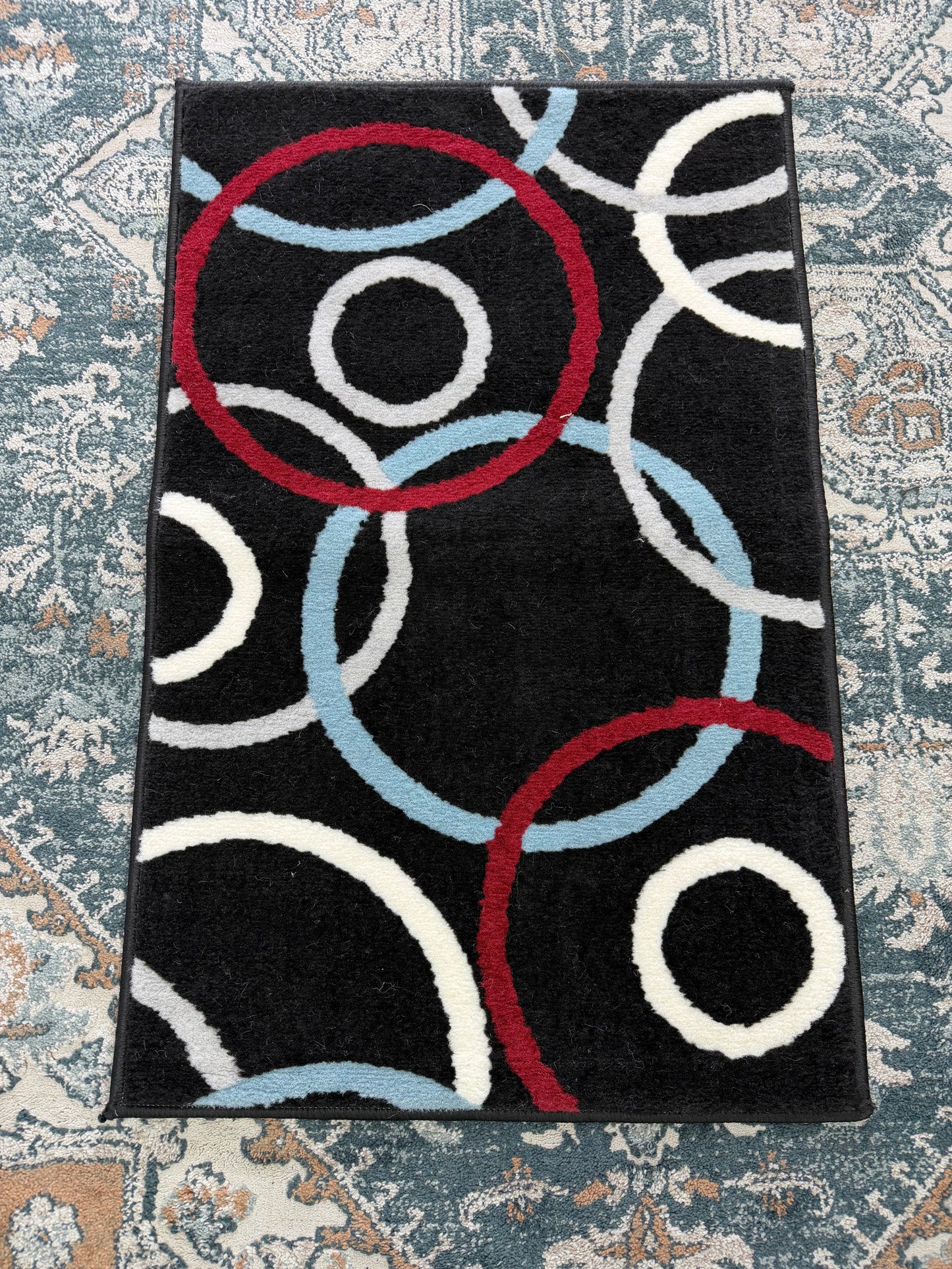 Oasis Area Rug – Black, Burgundy, and Light Blue (2x3)