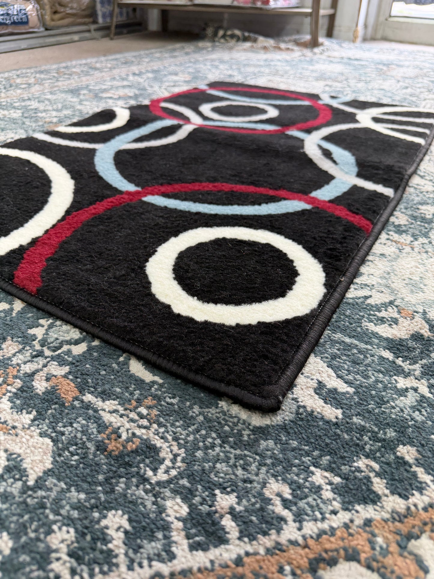 Oasis Area Rug – Black, Burgundy, and Light Blue (2x3)